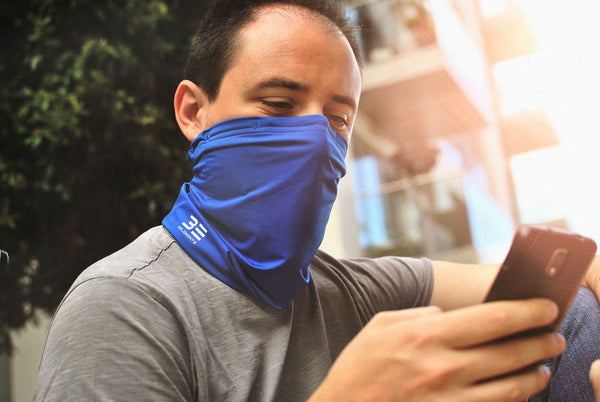 Man wear Three Elements Air Filtering Scarf Blue