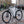 Load image into Gallery viewer, A Carr-e e-bike parked on a street in London, branded as CYCL.
