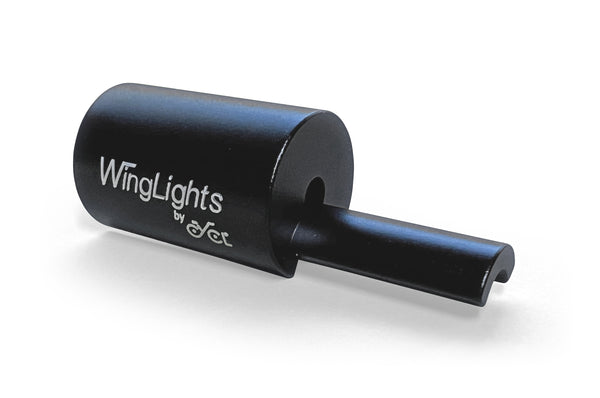 A compact black tube with the CYCL WingLights Aluminium Adaptor for Electric Scooters on it. Its adjustable speed settings make it a versatile tool for DIY projects, reducing fatigue and improving productivity.