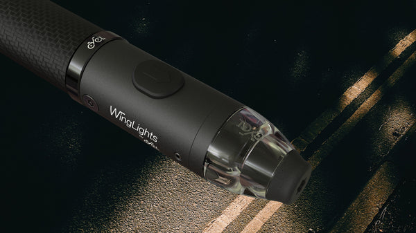 A black CYCL WingLights nExt vaporizer sitting on top of a road.